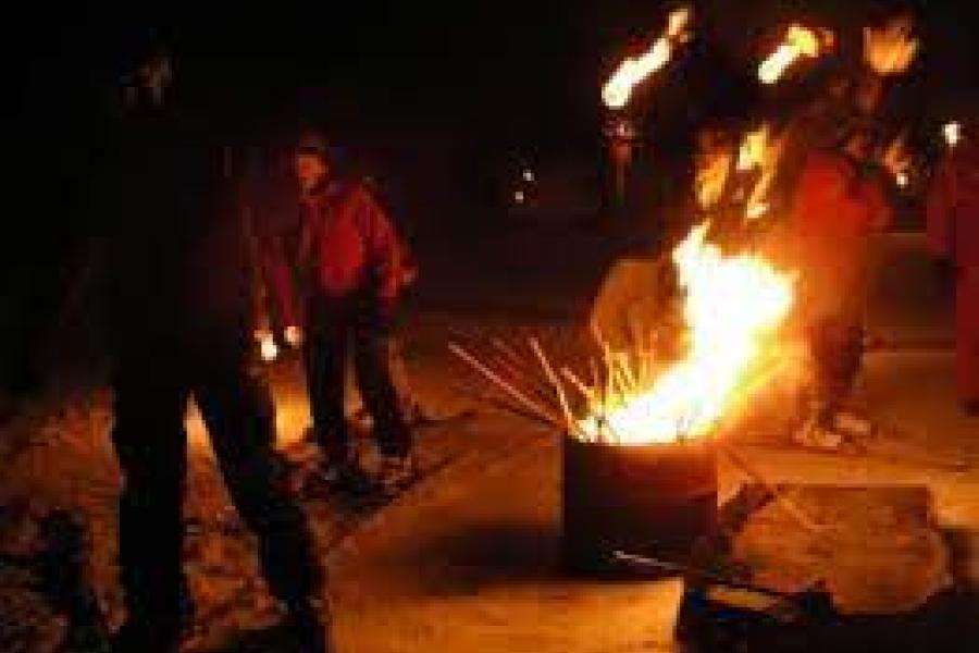 Torchlight procession on cross-country skis